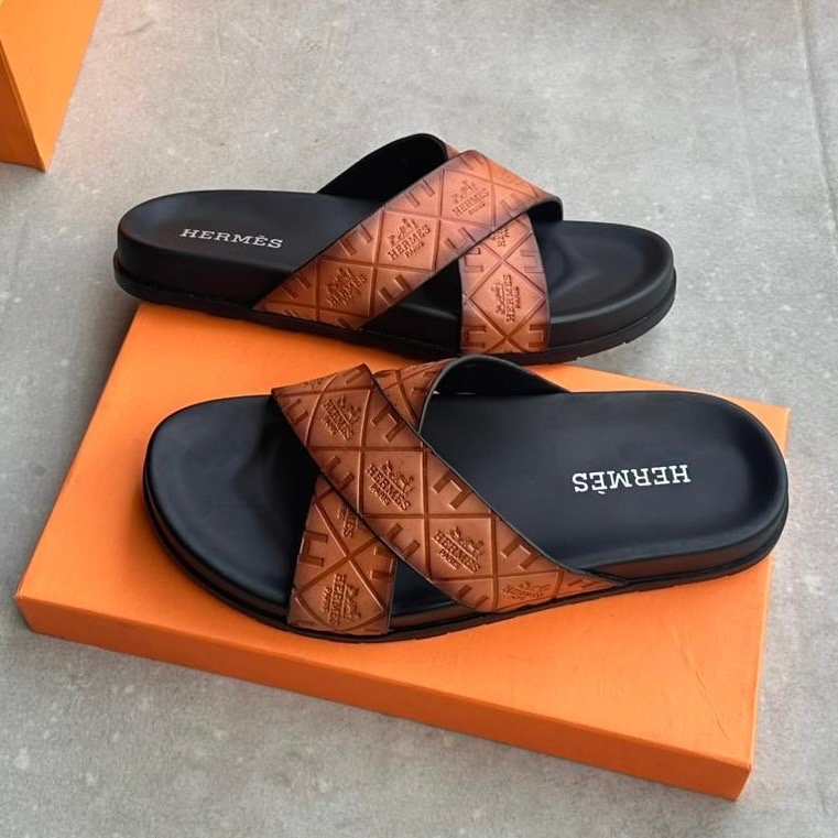 c59780ce-17ce-436c-918d-cdb90fe26dc2 Hermes embroidered canva crisscross leather slide - Image 1