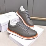 Brunello Cucinelli men's full grain leather sneakers with a contrasting orange sole Grey colour