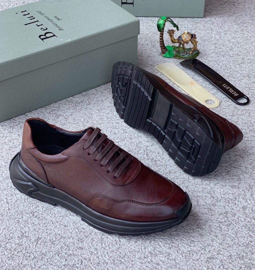 8295b77a-40a6-4a40-8f07-16b4b3249e97 Berluti shadow sneakers luxury leather slip-on trainers crafted with venezia calf leather brown colour - Image 1