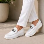Emori white flat pebble – grain leather loafers with contrasting white rubber sole.
