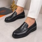 OGGI script-patterned penny loafers black