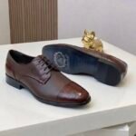 sepentini crocodile-embossed cap toes and texture leather uppers brown
